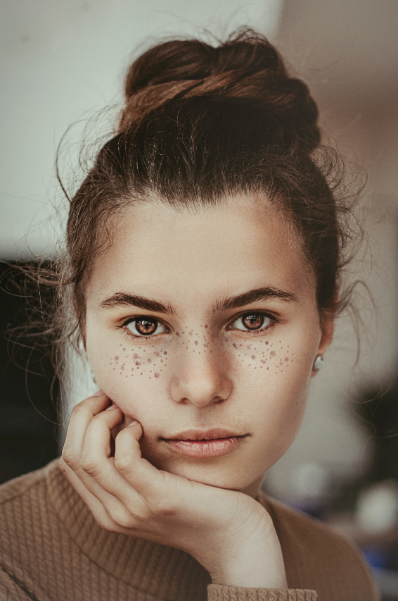 A girl with downturned or prone eyes and eyebrows, suggesting that she may be a T type with either Te or Ti according to the visual personality test used by Physiotype.